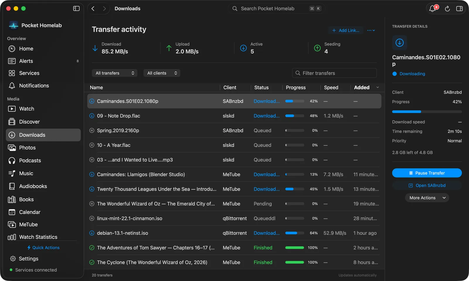 Downloads workspace with a transfers table and inspector