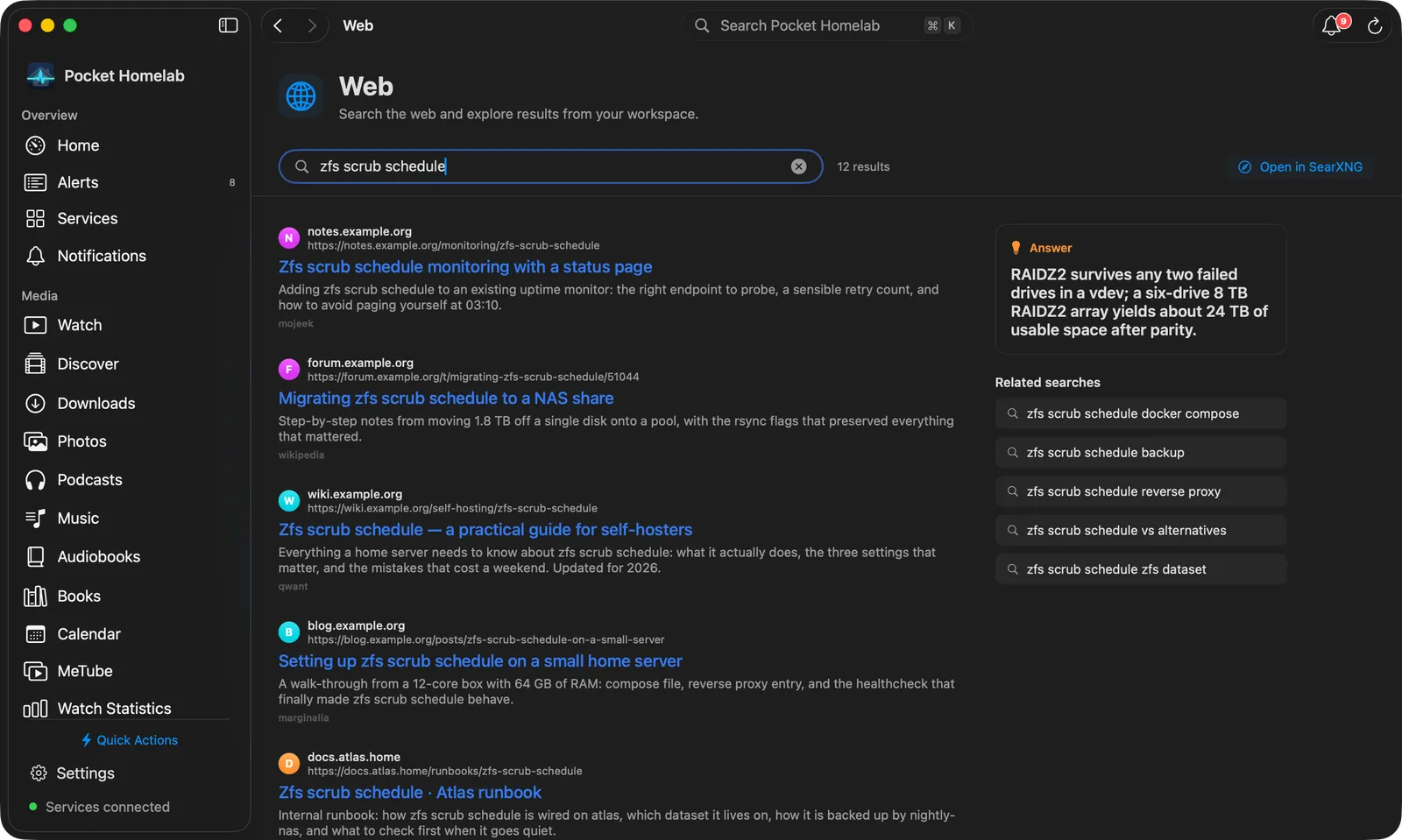 Mac Web page with results in a column, an answer card and related searches beside them